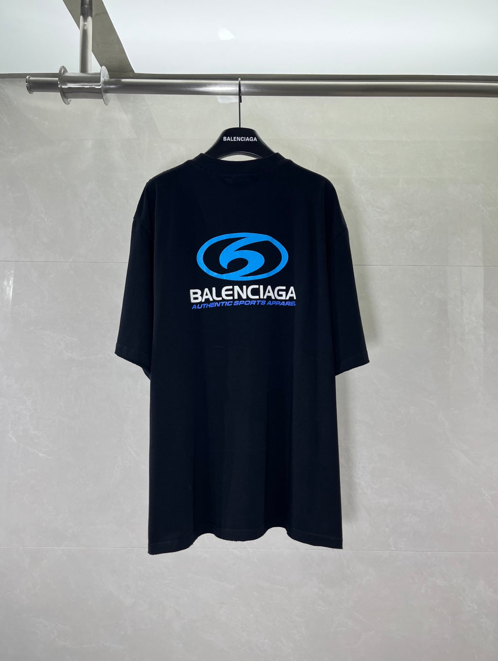 Black Balenciaga graphic T-shirt with blue logo on back