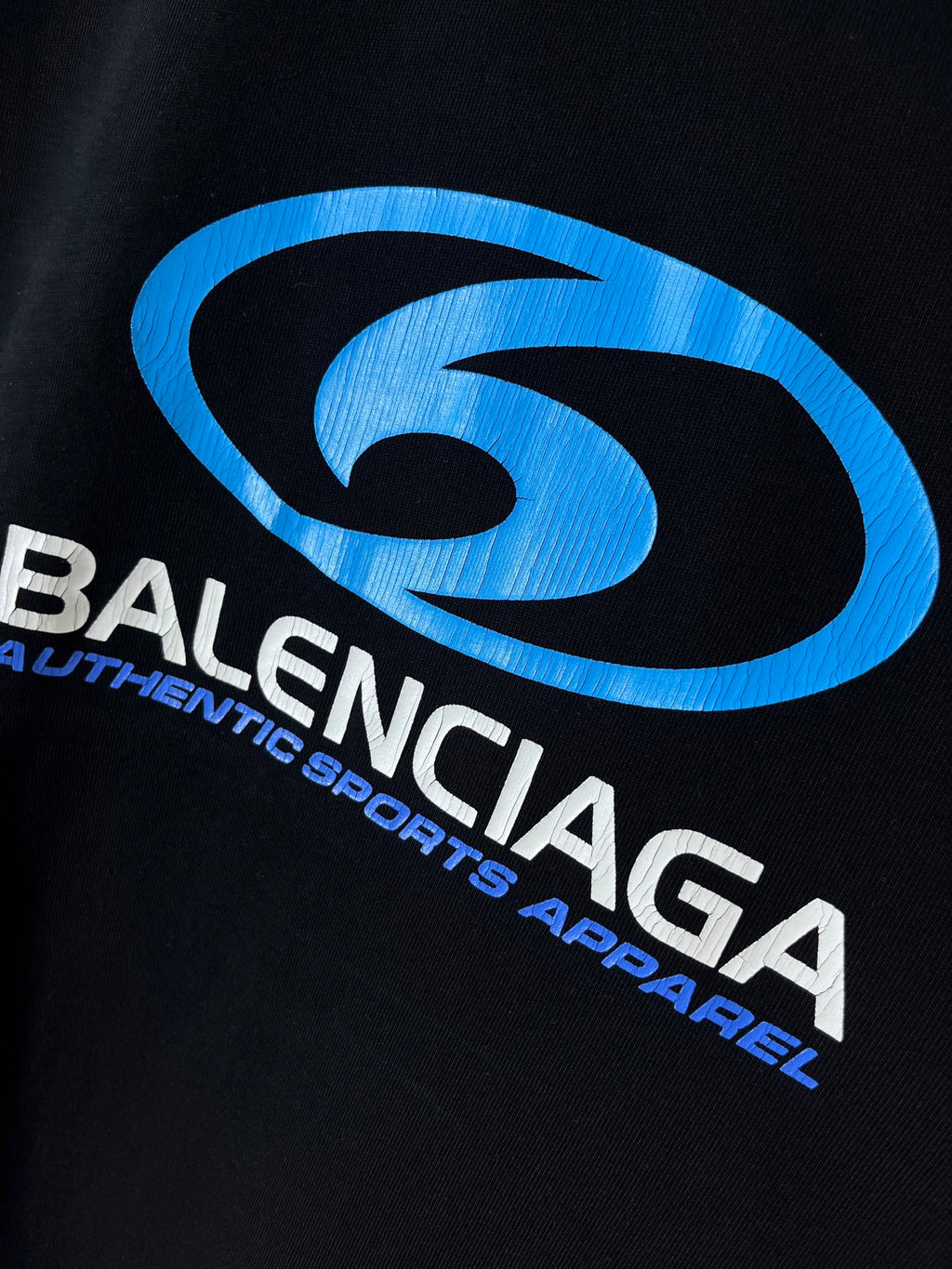 Black Balenciaga T-shirt with large blue logo graphic and white text