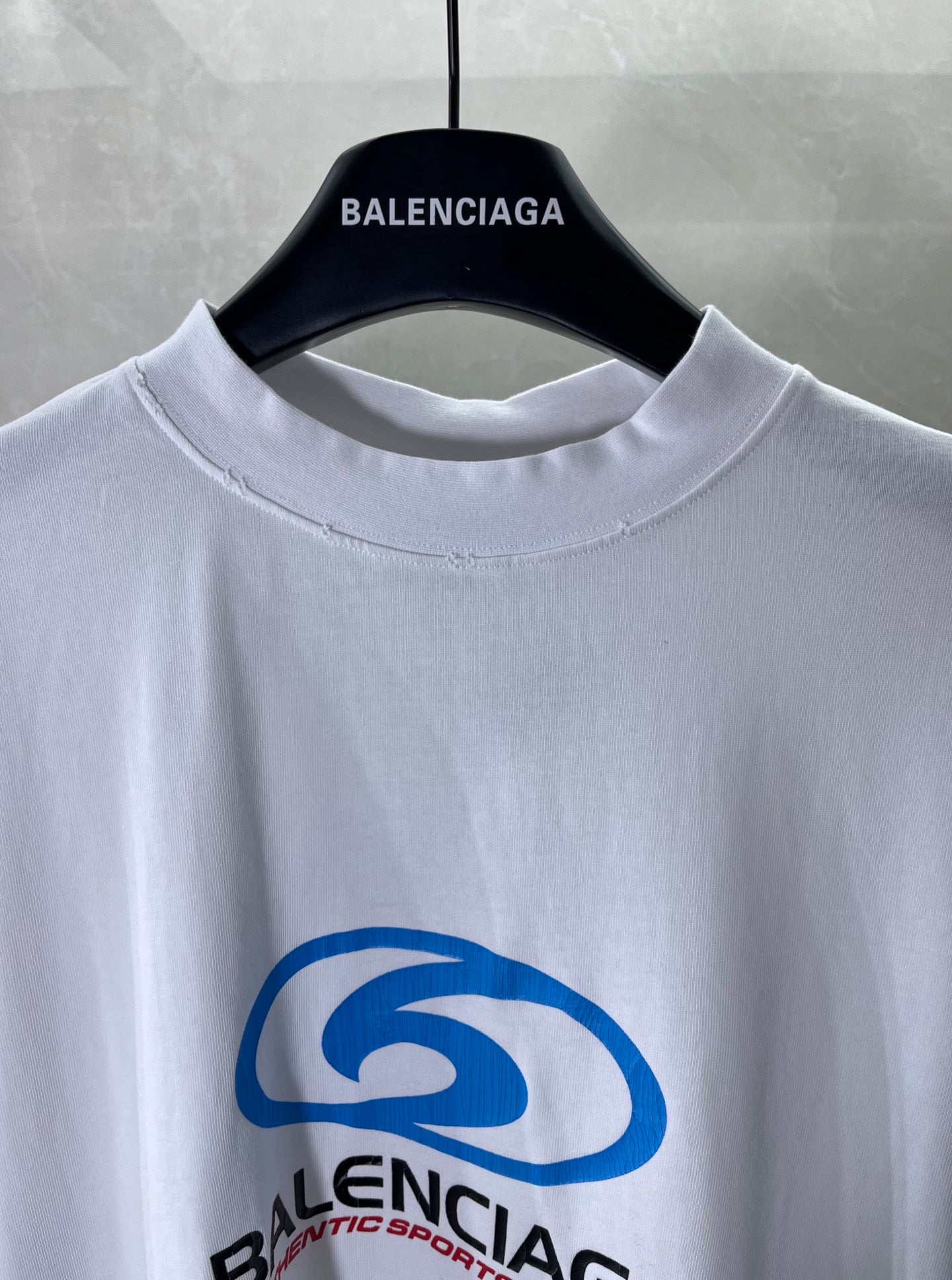 Balenciaga white T-shirt with blue logo graphic and crew neckline