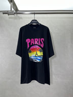 Balenciaga black T-shirt with pink PARIS logo and colorful beach graphic