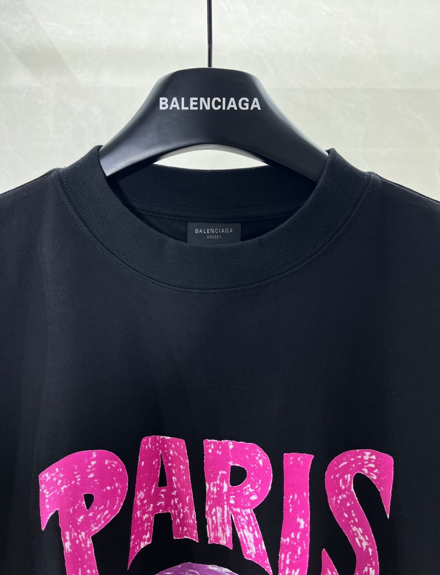 Balenciaga black T-shirt neckline with BALENCIAGA logo at center collar