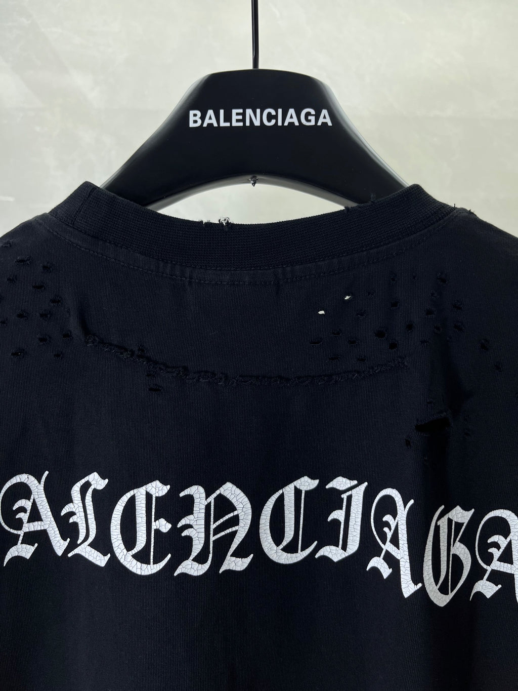 Balenciaga black T-shirt back with distressed logo across the upper section