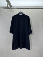 Balenciaga short-sleeve T-shirt in dark color, back view with centered logo tag