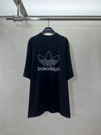 Balenciaga short-sleeve T-shirt in dark color with white trefoil logo on front