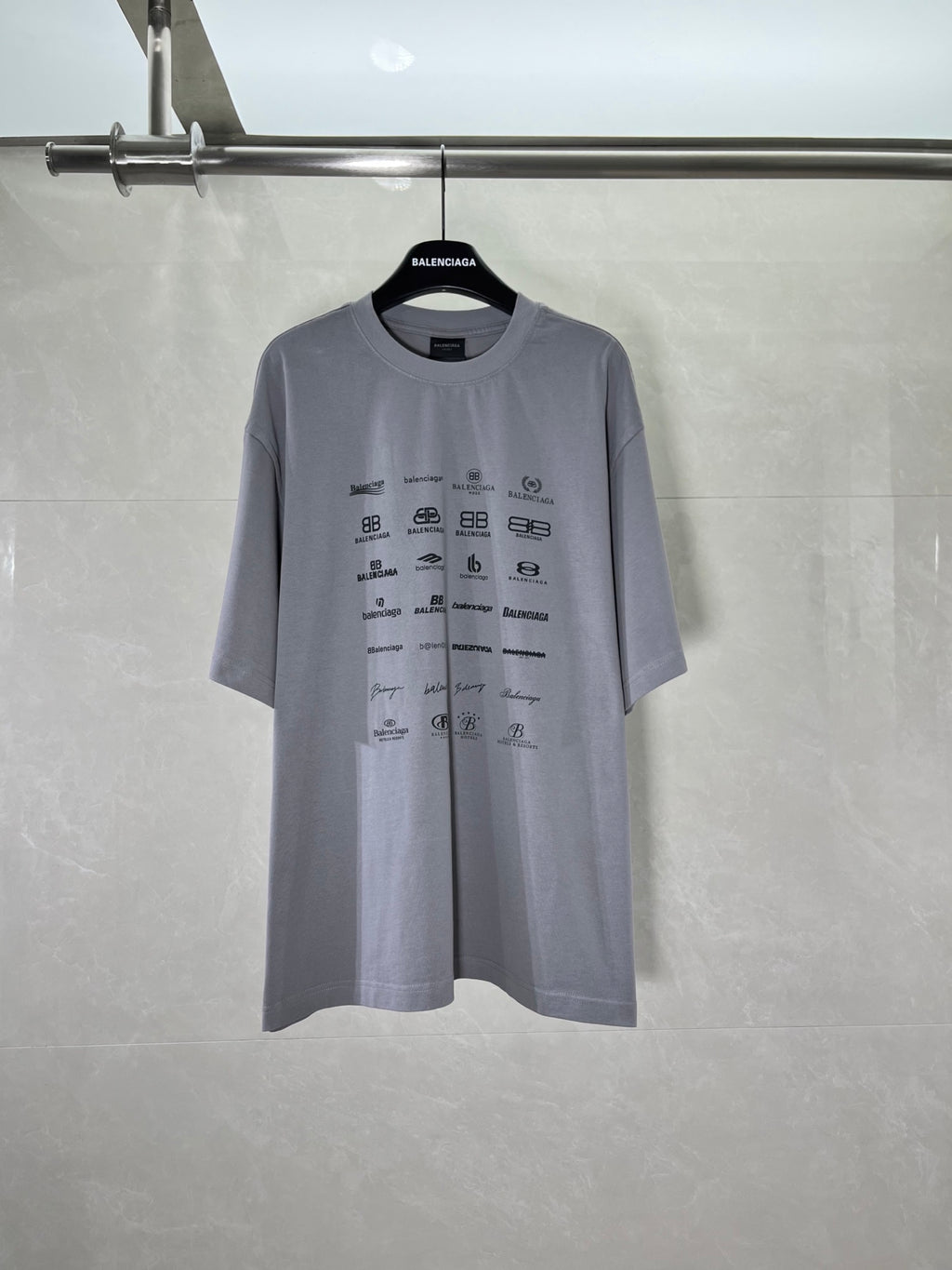 Balenciaga short-sleeve T-shirt in light gray with all-over logo print