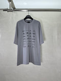 Balenciaga short-sleeve T-shirt in light gray with all-over logo print