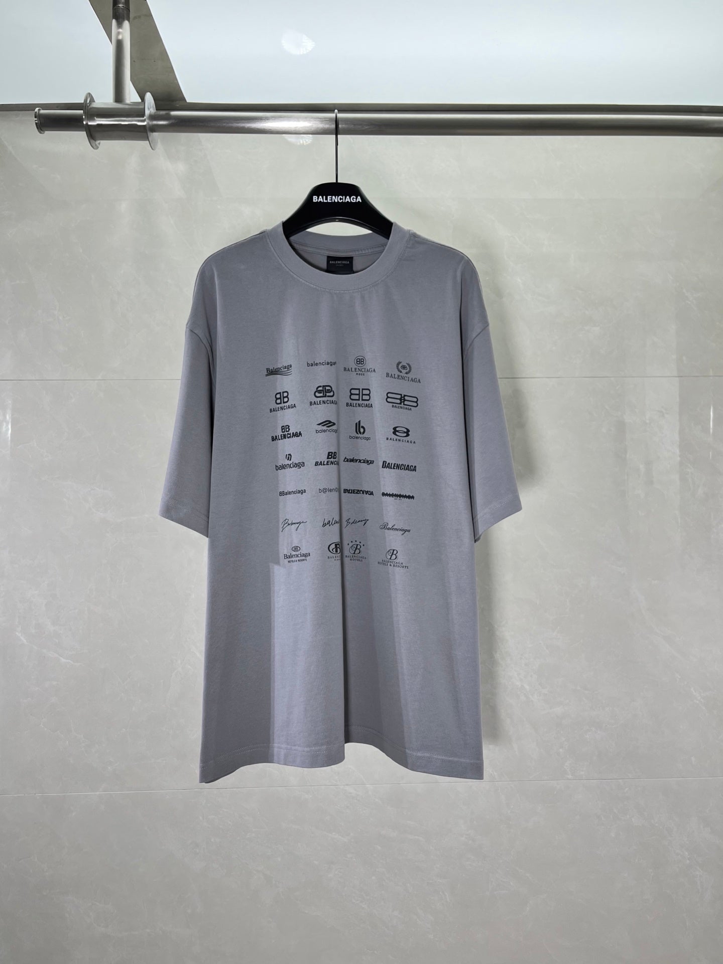 Balenciaga short-sleeve T-shirt in light gray with all-over logo print