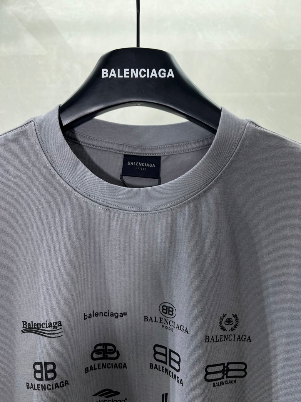Balenciaga crewneck short-sleeve T-shirt neckline close-up with logo print
