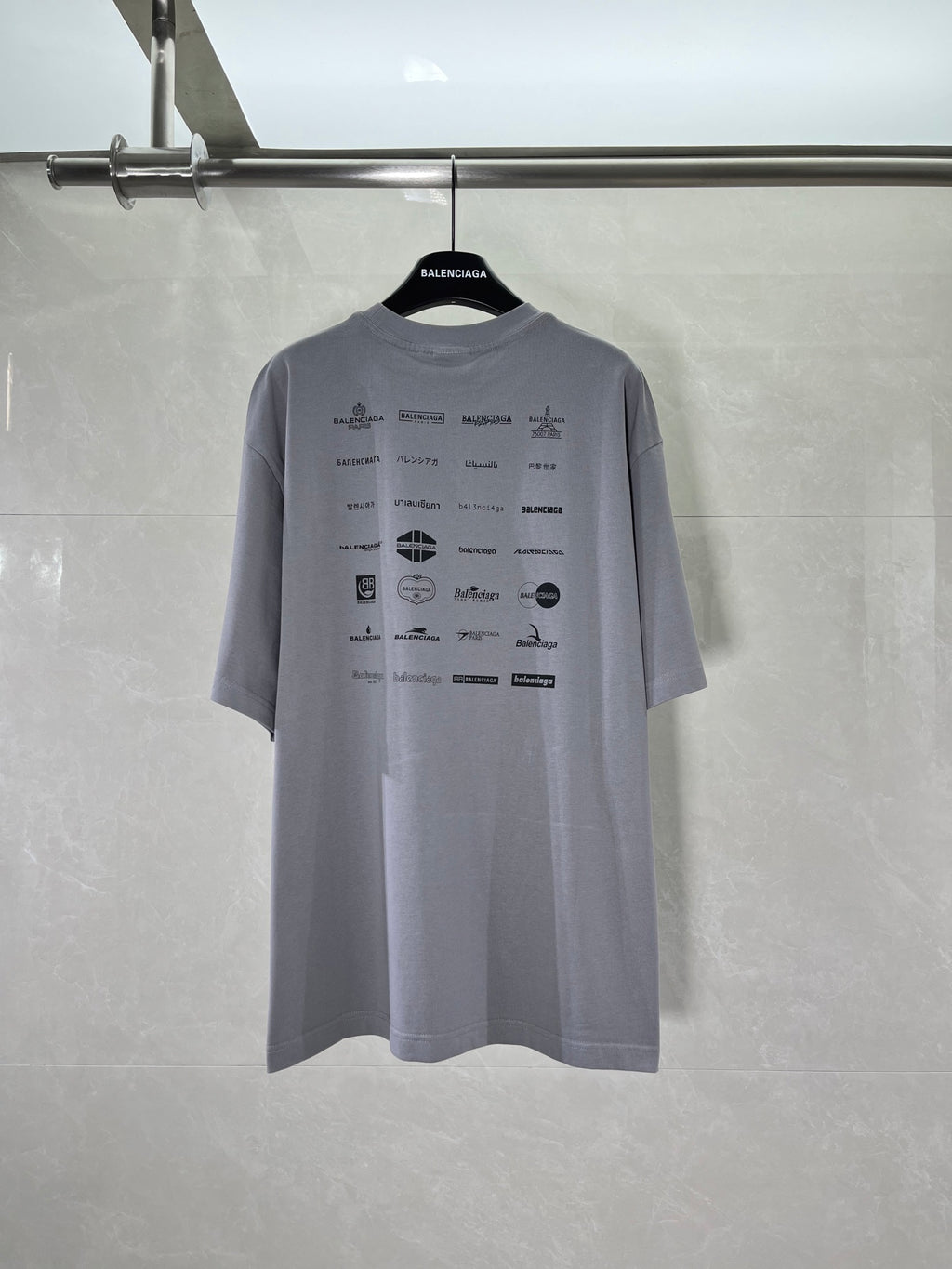 Balenciaga short-sleeve T-shirt back view with all-over logo print