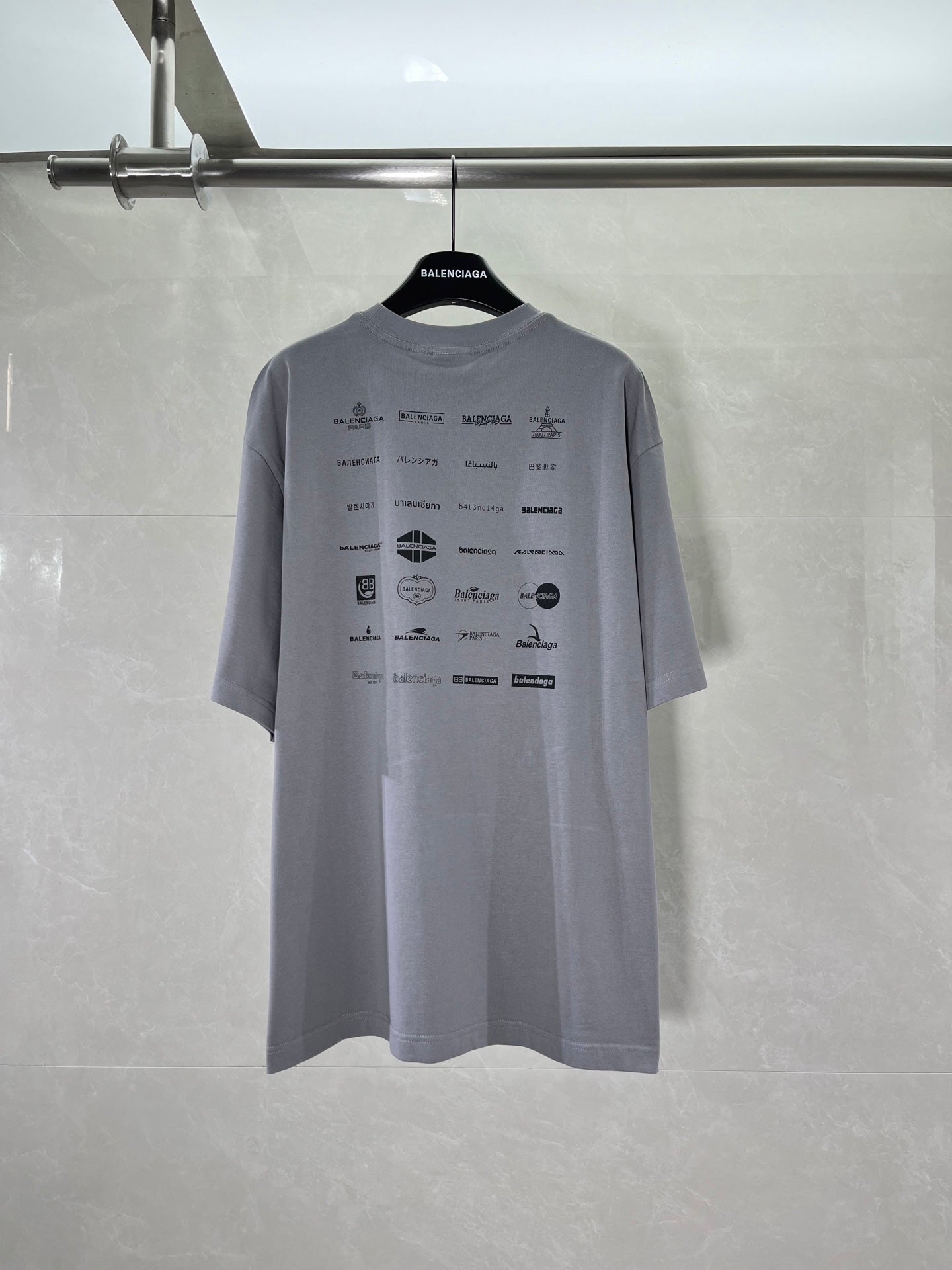 Balenciaga short-sleeve T-shirt back view with all-over logo print