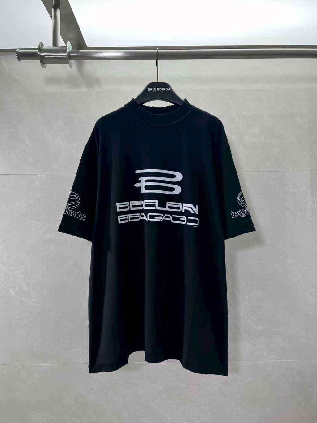 Balenciaga black graphic T-shirt with large front logo print, short sleeves