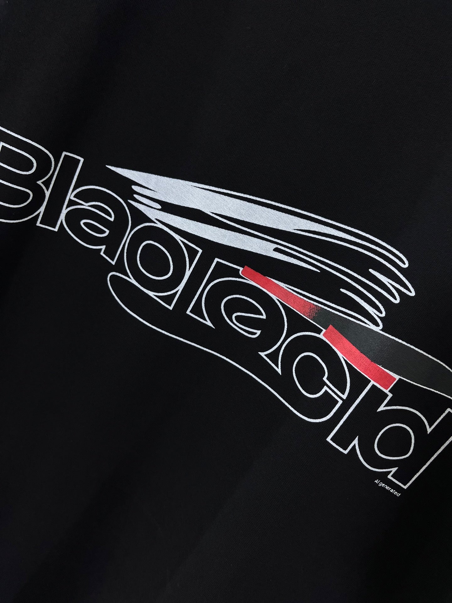 Balenciaga black graphic T-shirt close-up of colorful logo graphic