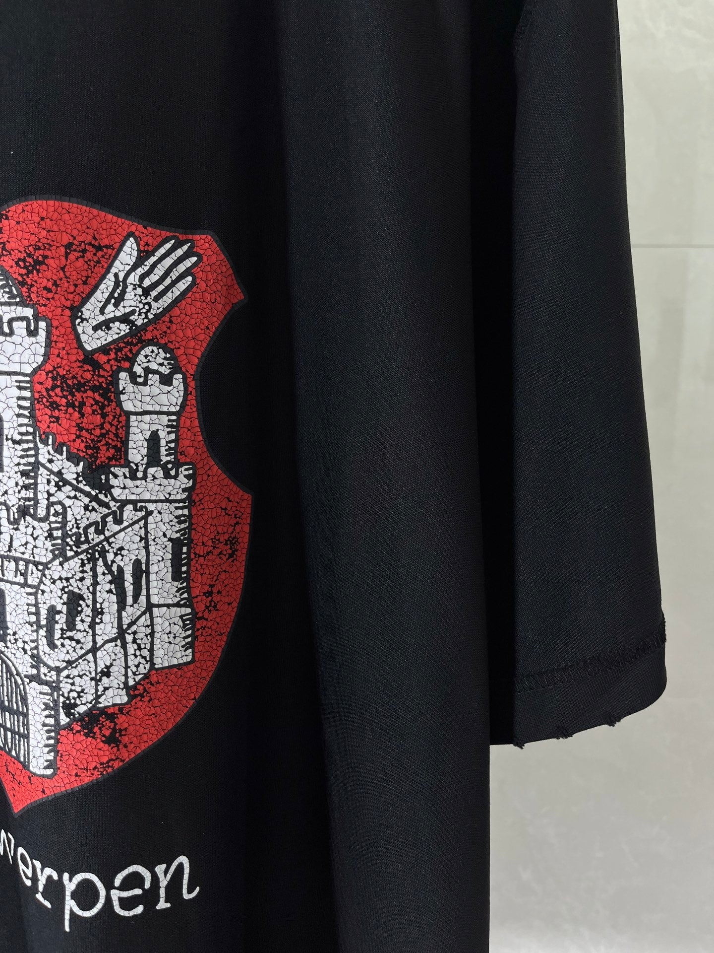 Balenciaga black T-shirt with Antwerp crest graphic and “Antwerpen” text