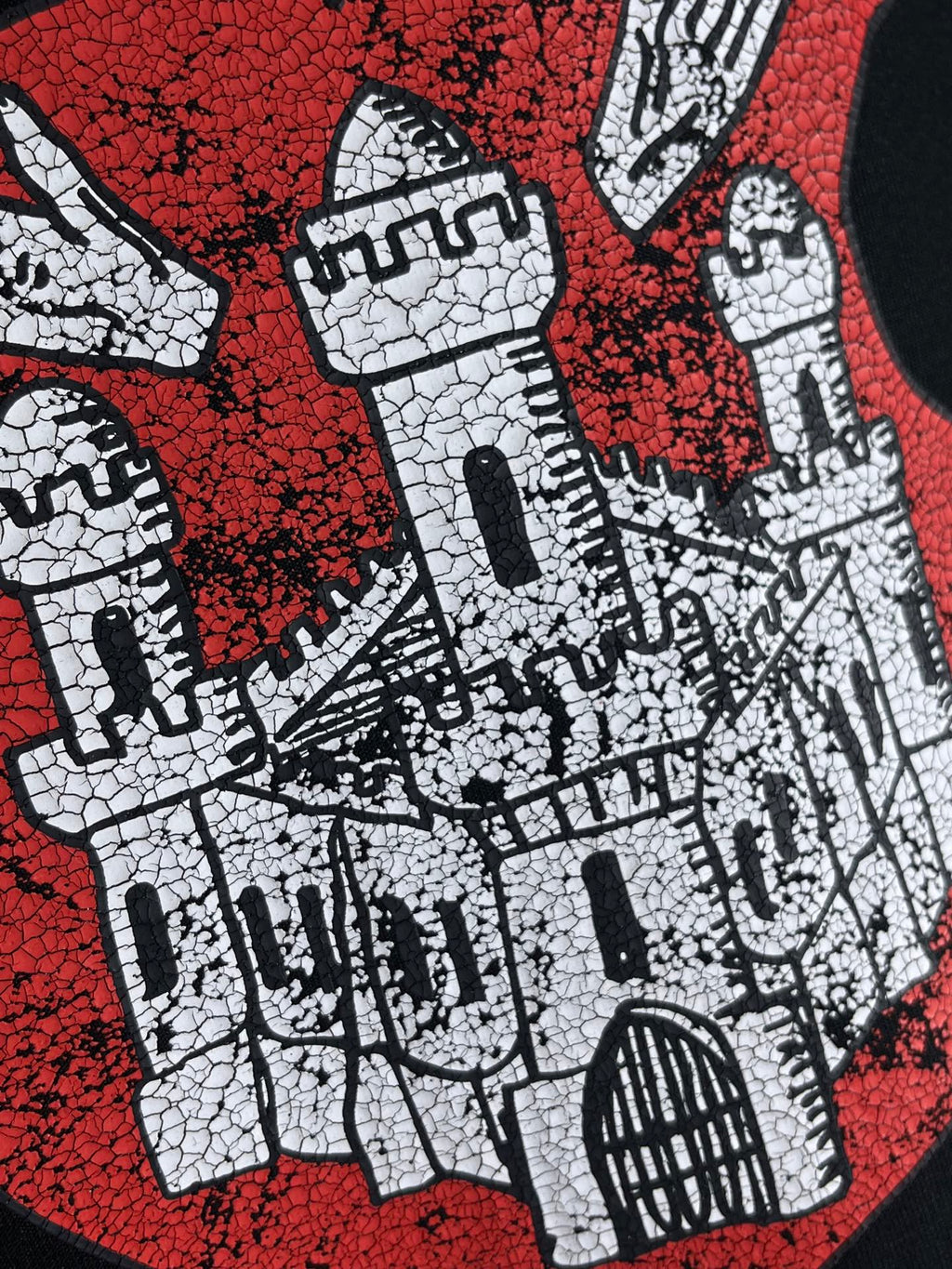 Balenciaga black T-shirt with detailed red-and-white crest artwork