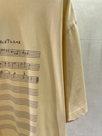Balenciaga cream T-shirt fabric with partial musical print on front