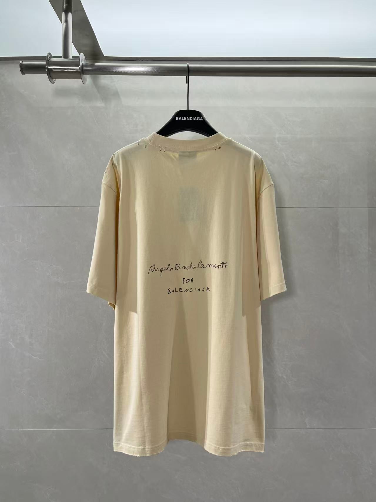Balenciaga cream graphic T-shirt with back text and musical logo print
