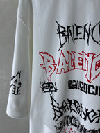 White T-shirt sleeve and front with black and red graffiti-style graphic lettering
