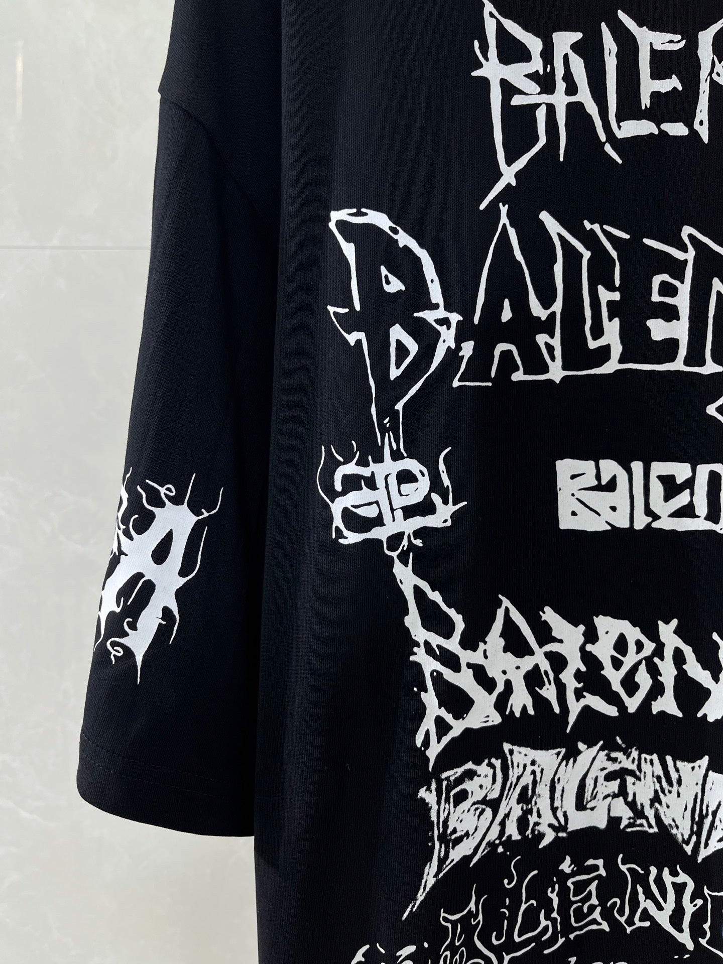 Balenciaga T-shirt sleeve and front graphic, black with white street-style print