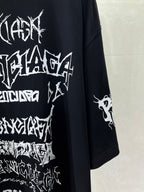 Balenciaga T-shirt close-up with large white graphic print and printed sleeve