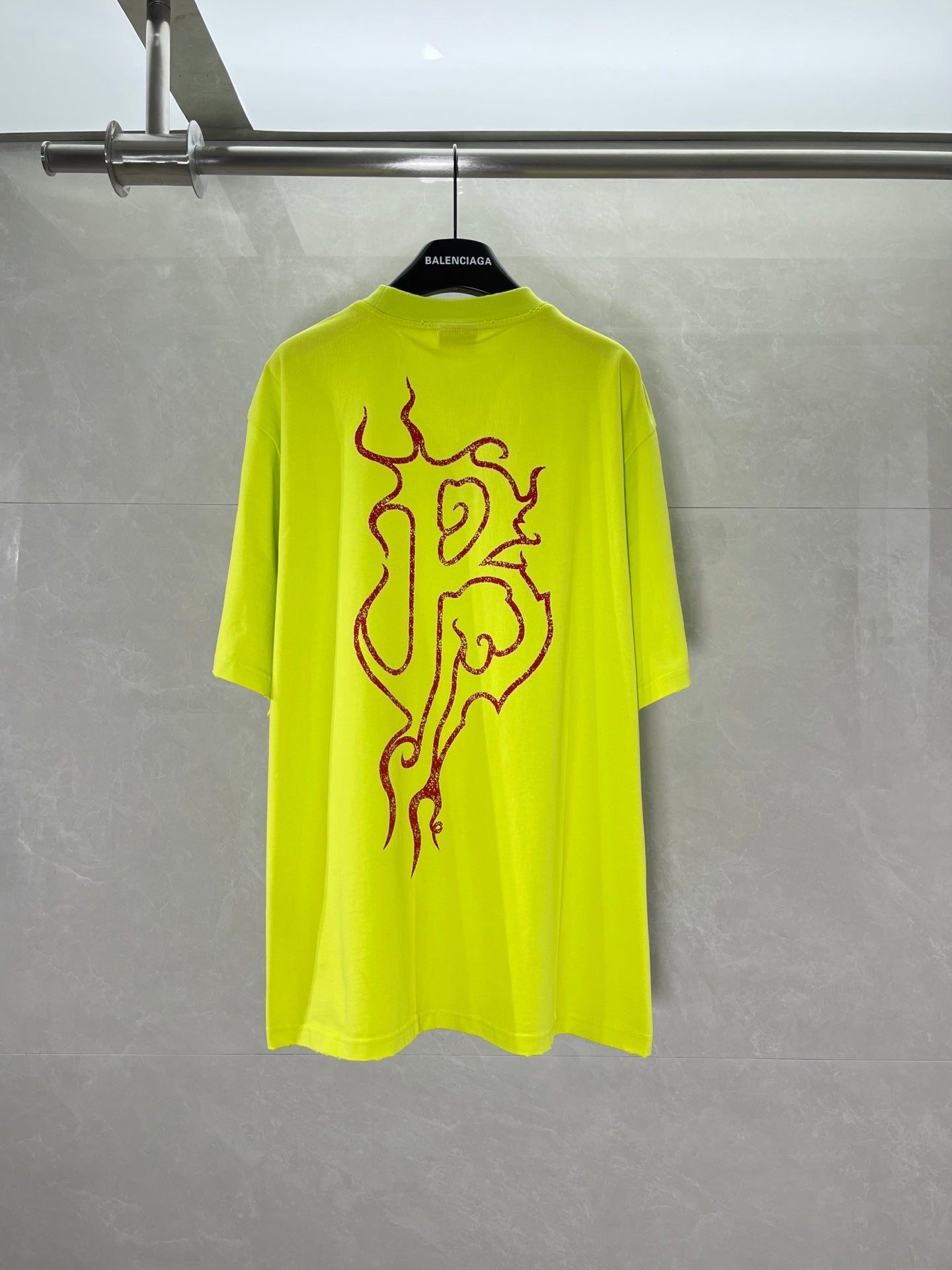 Lime green short-sleeve T-shirt with large back graphic logo print