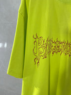 Lime green T-shirt sleeve and front graphic motif in red