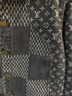 Louis Vuitton denim jacket close-up of monogram pattern and gold button detail