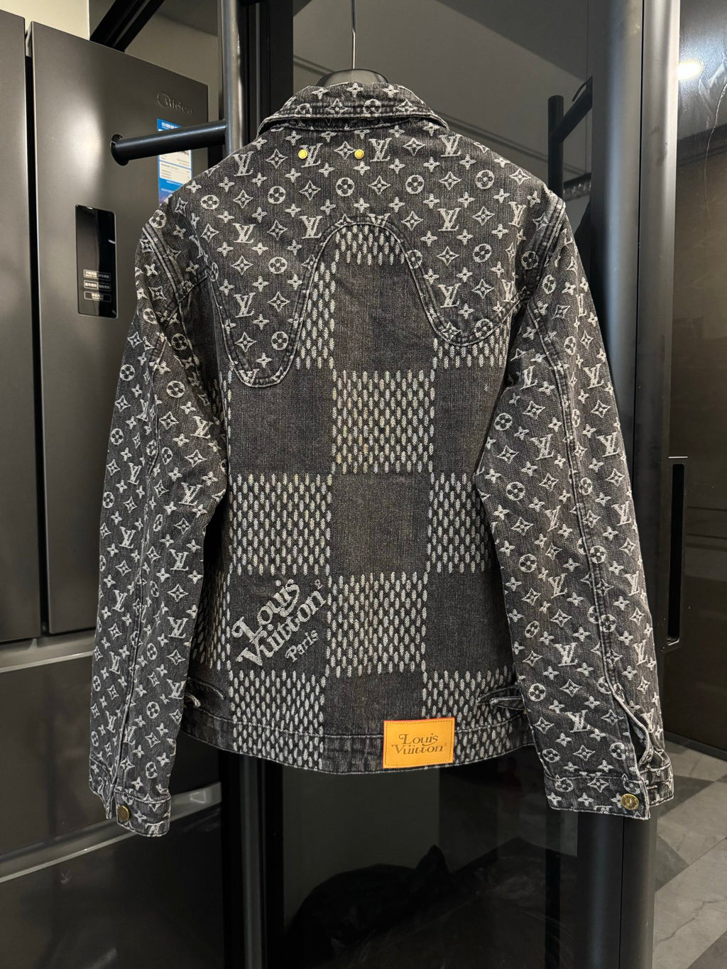 Louis Vuitton denim jacket back with monogram print and check panel, button closure