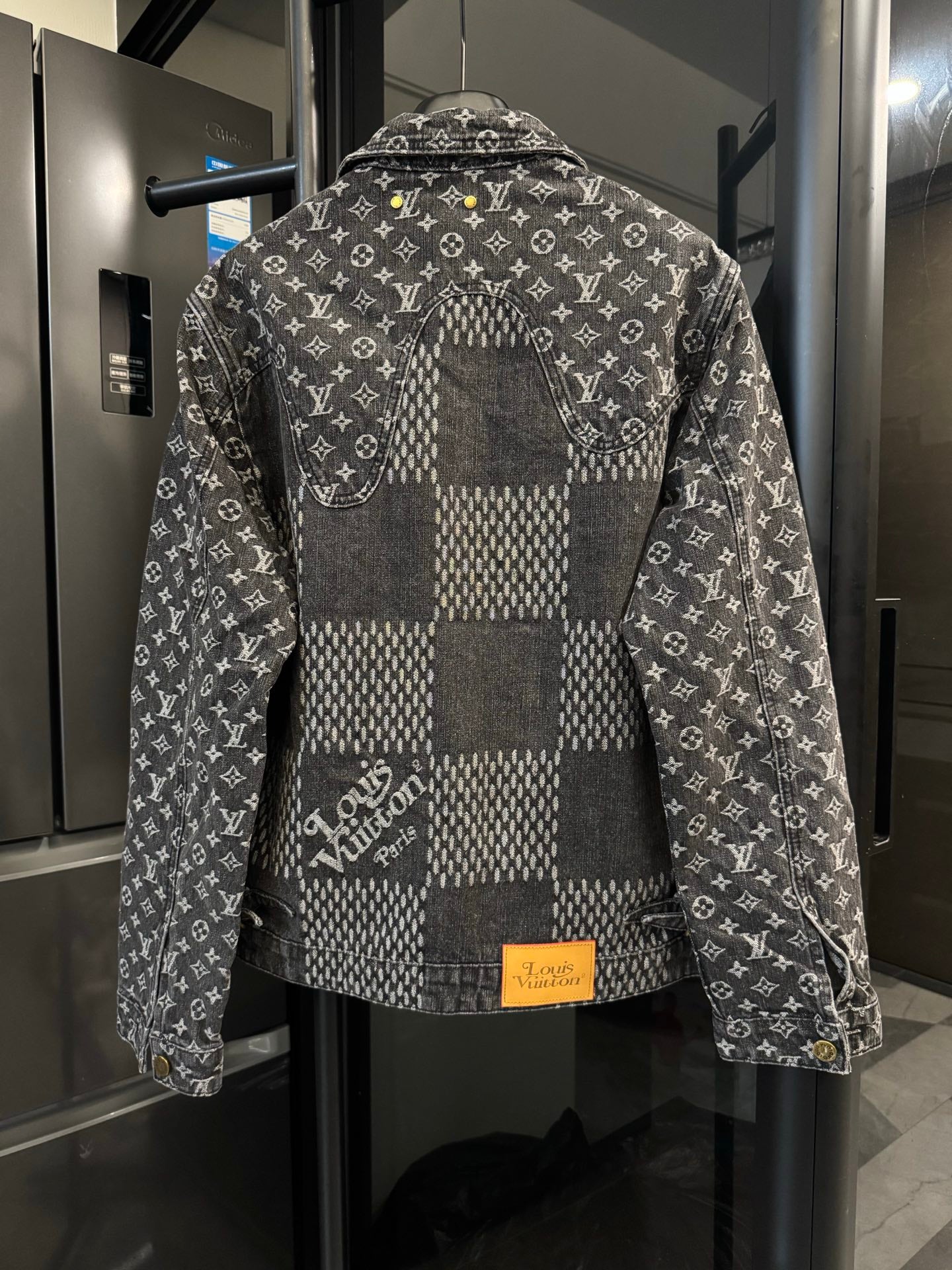 Louis Vuitton denim jacket back with monogram print and check panel, button closure