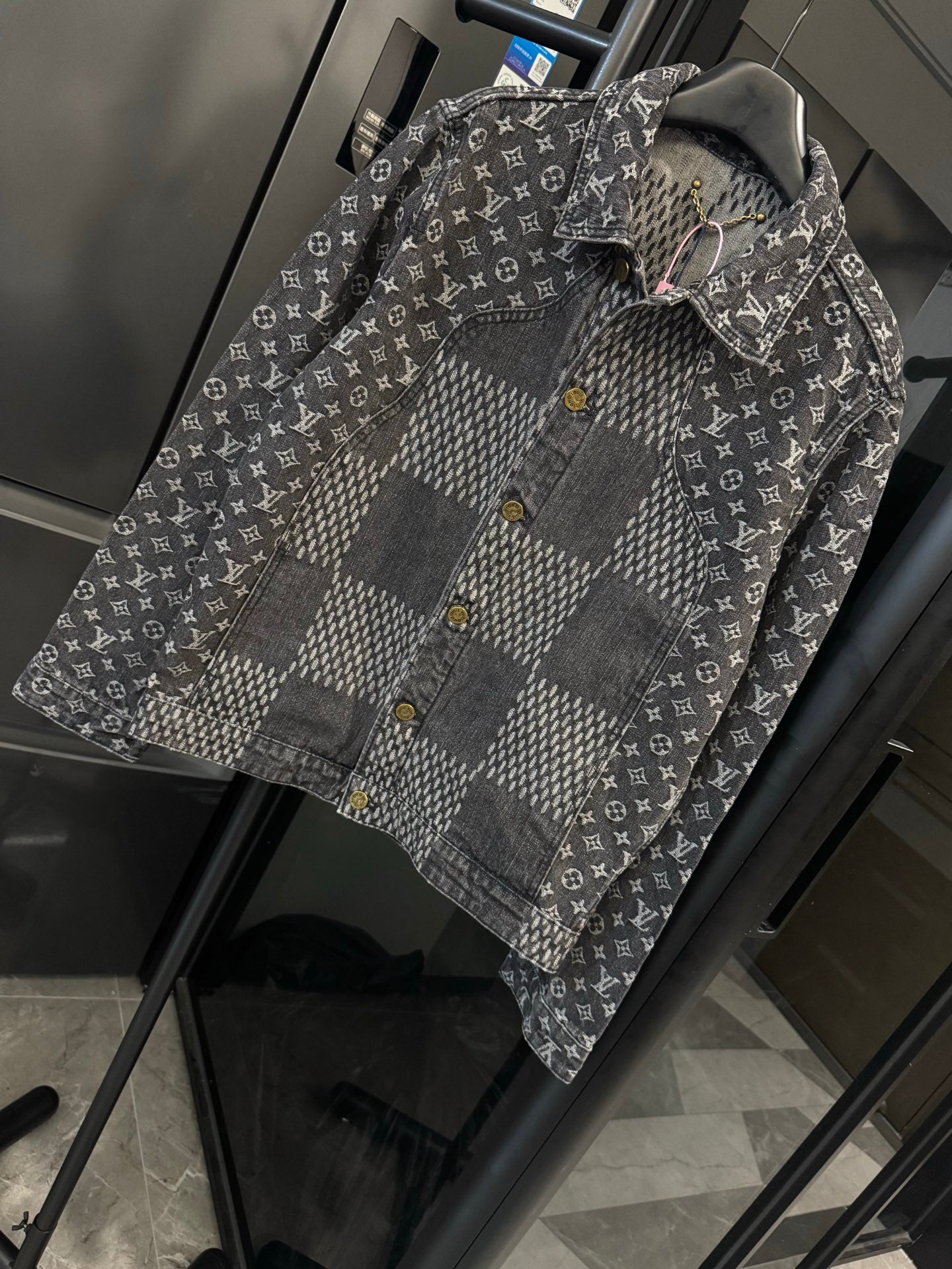Louis Vuitton denim jacket with monogram print and gray check panel, button front