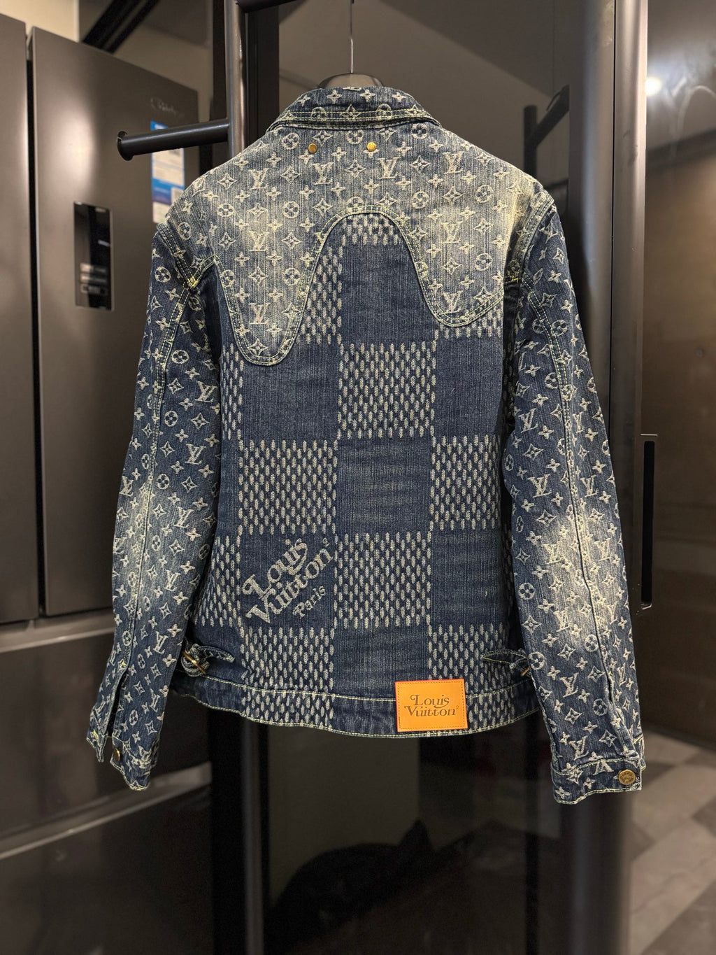 Louis Vuitton monogram denim jacket, back view with blue check panel