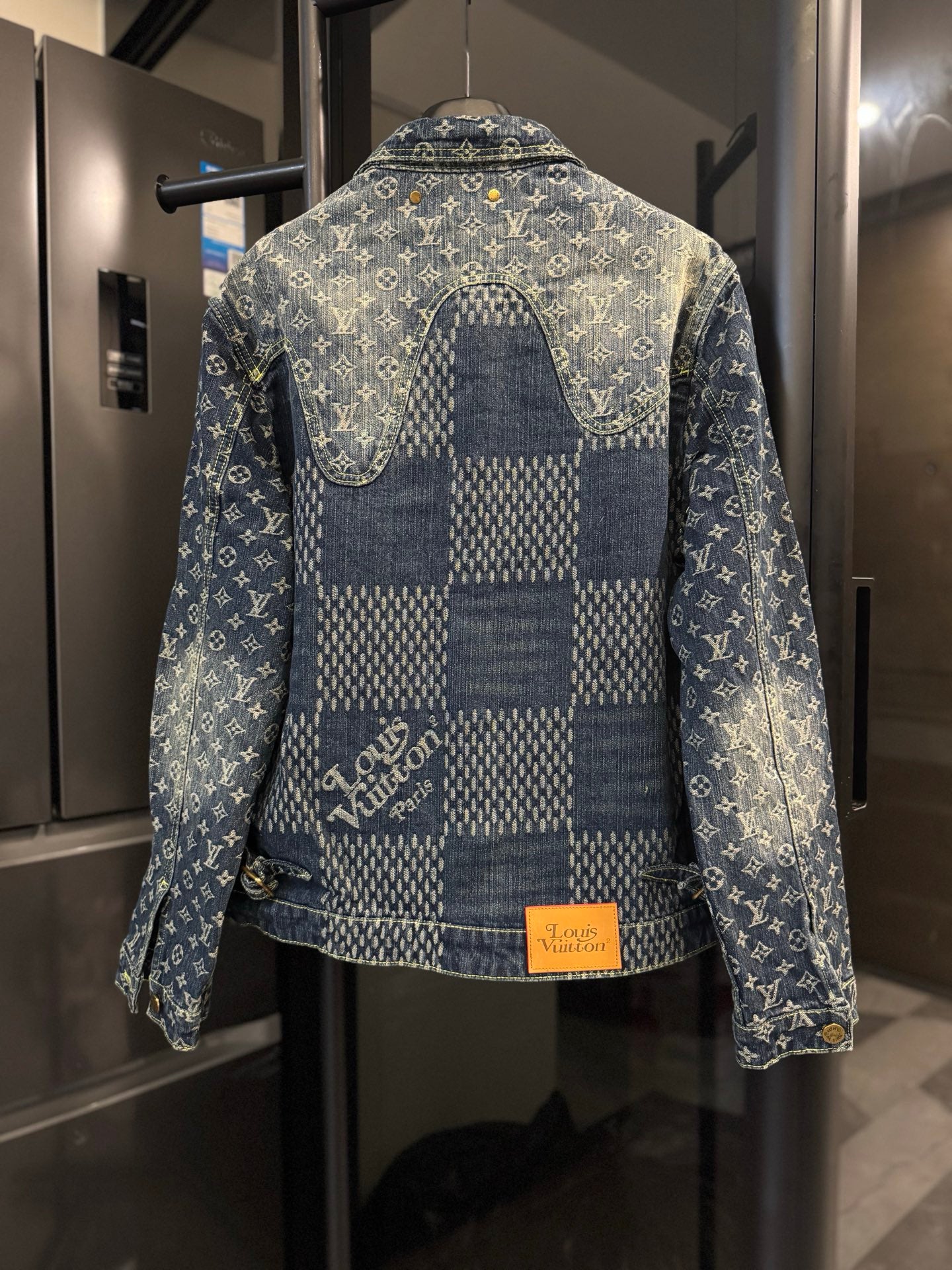Louis Vuitton monogram denim jacket, back view with blue check panel