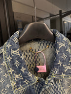 Louis Vuitton monogram denim jacket collar with pink tag and gold chain pull