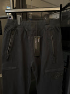 Stone Island cargo trousers, dark gray, close-up of waistband and cargo pocket with logo patch