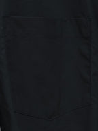 Balenciaga black chest pocket with stitched edges on a long-sleeve shirt