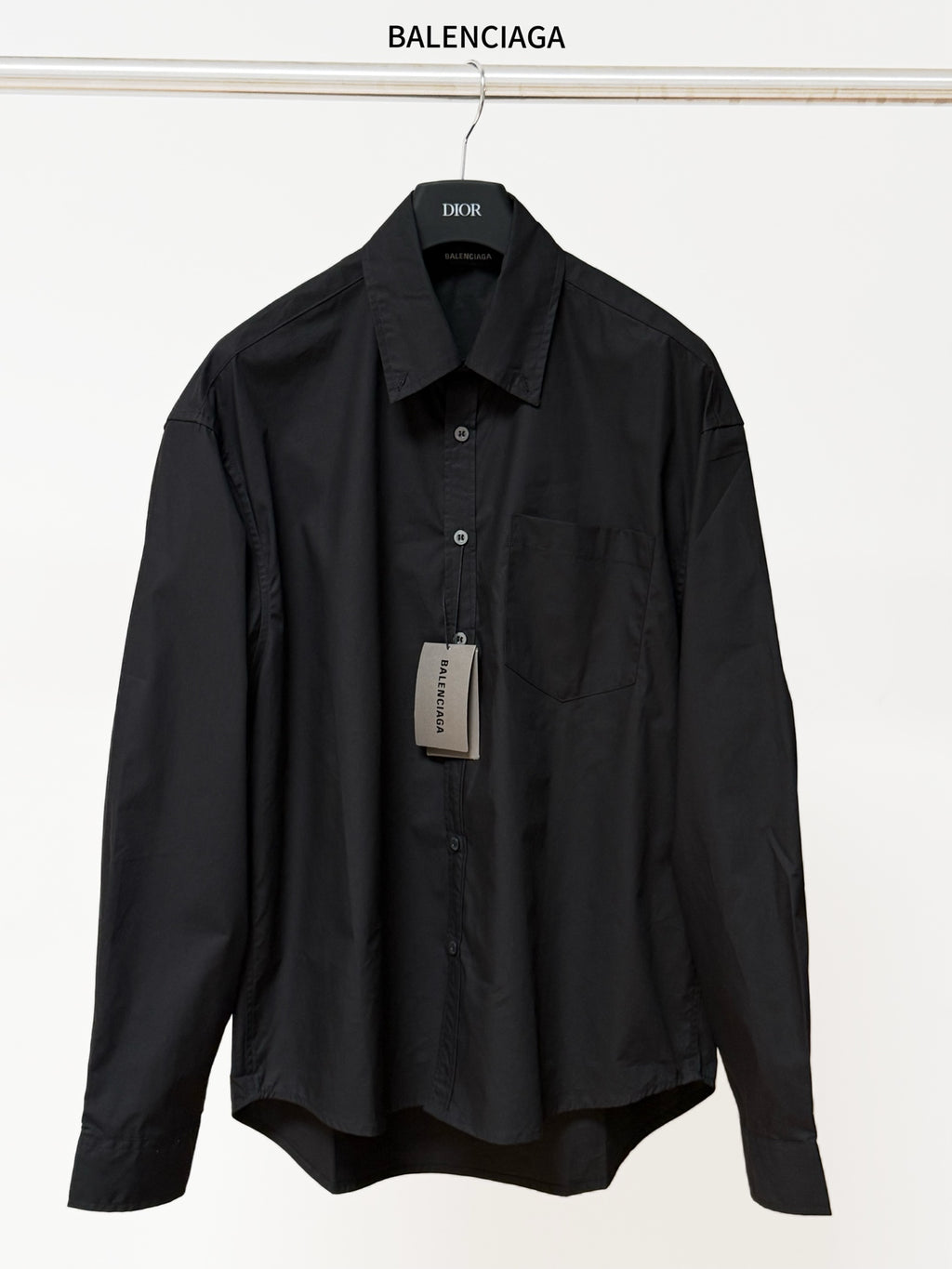Balenciaga black long-sleeve button-up shirt with point collar and front buttons