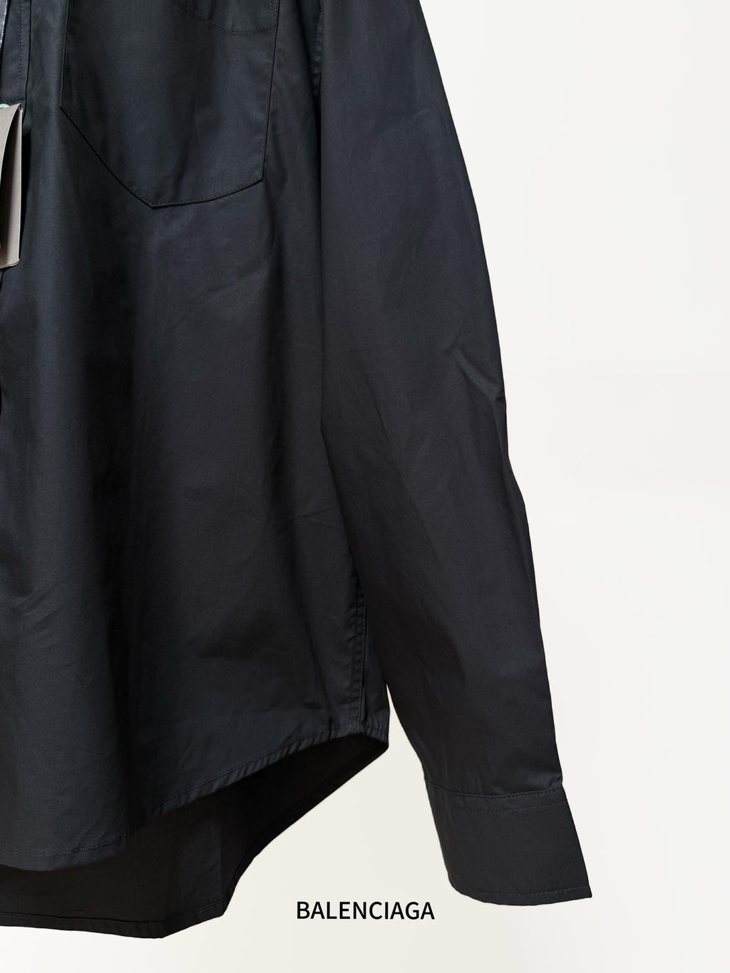 Balenciaga black long-sleeve shirt with side seam and curved hem