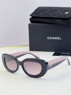 Chanel cat-eye sunglasses with dark frames and pale pink tinted lenses