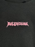 Short-sleeve top with pink Balenciaga logo on dark fabric