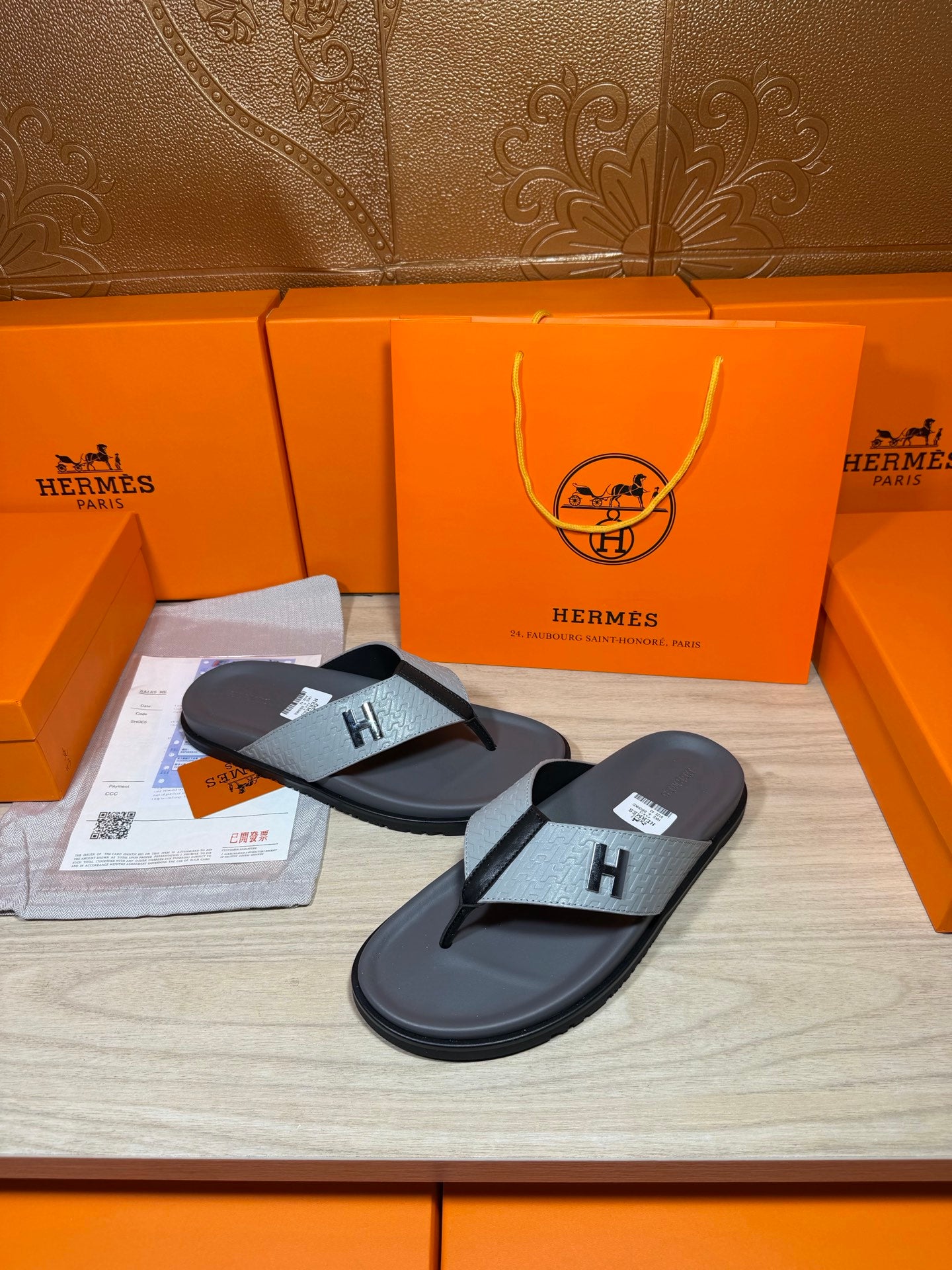 Hermes flip-flop sandals, dark gray soles with gray H logo strap detail