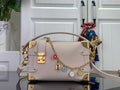 Louis Vuitton handbag in light pink leather with gold hardware and chain shoulder strap