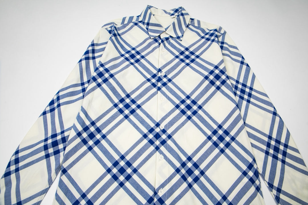 Burberry plaid shirt close-up: point collar, button placket, blue-and-cream checks