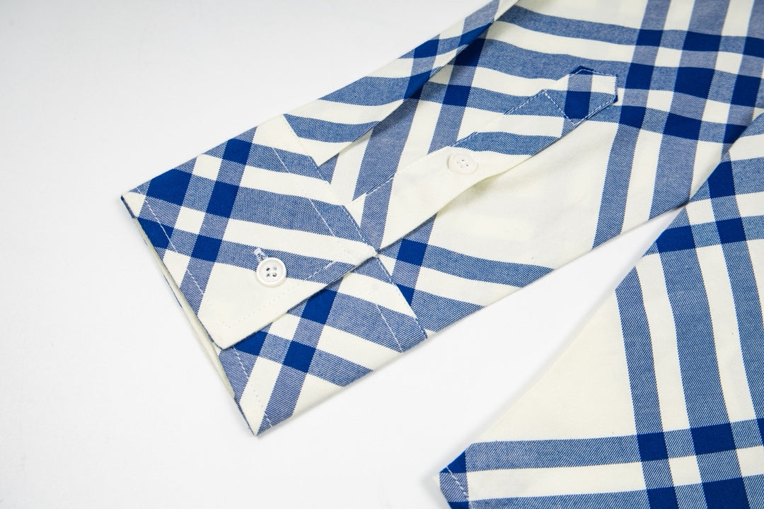 Burberry plaid shirt flat-lay: pointed collar and front buttons, blue-and-cream pattern
