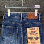 Blue denim jeans front view with belt loops, coin pocket, and RRL patch