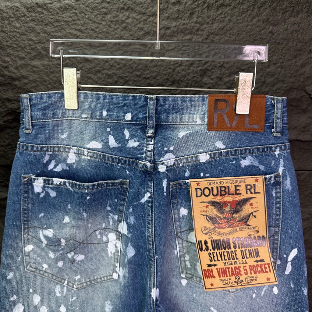 Ralph Lauren denim jeans with splatter white print and RL logo label on front pocket