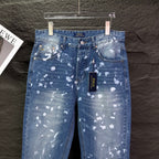 Blue denim jeans with white speckle print, POLO label on waistband, straight legs.