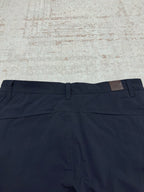 Dior navy pants with front fly, belt loops, and flat waistband