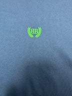 Balenciaga blue T-shirt with neon green crest logo on chest