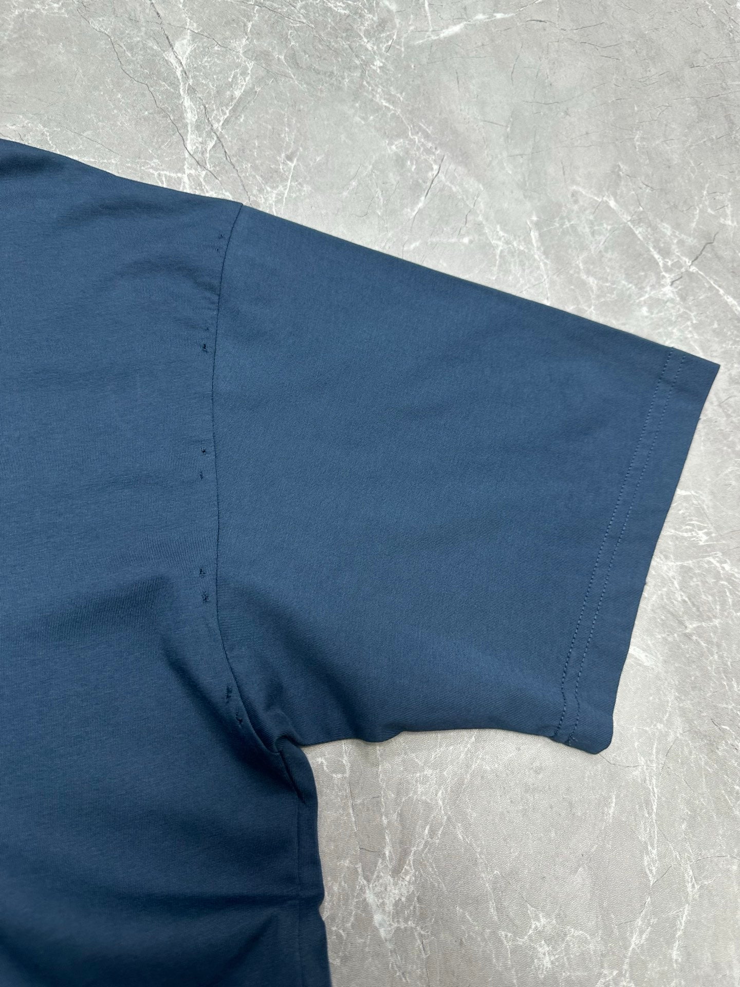 Balenciaga blue T-shirt sleeve and side seam view