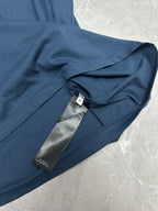 Balenciaga short-sleeve T-shirt sleeve close-up with care label at inner neck