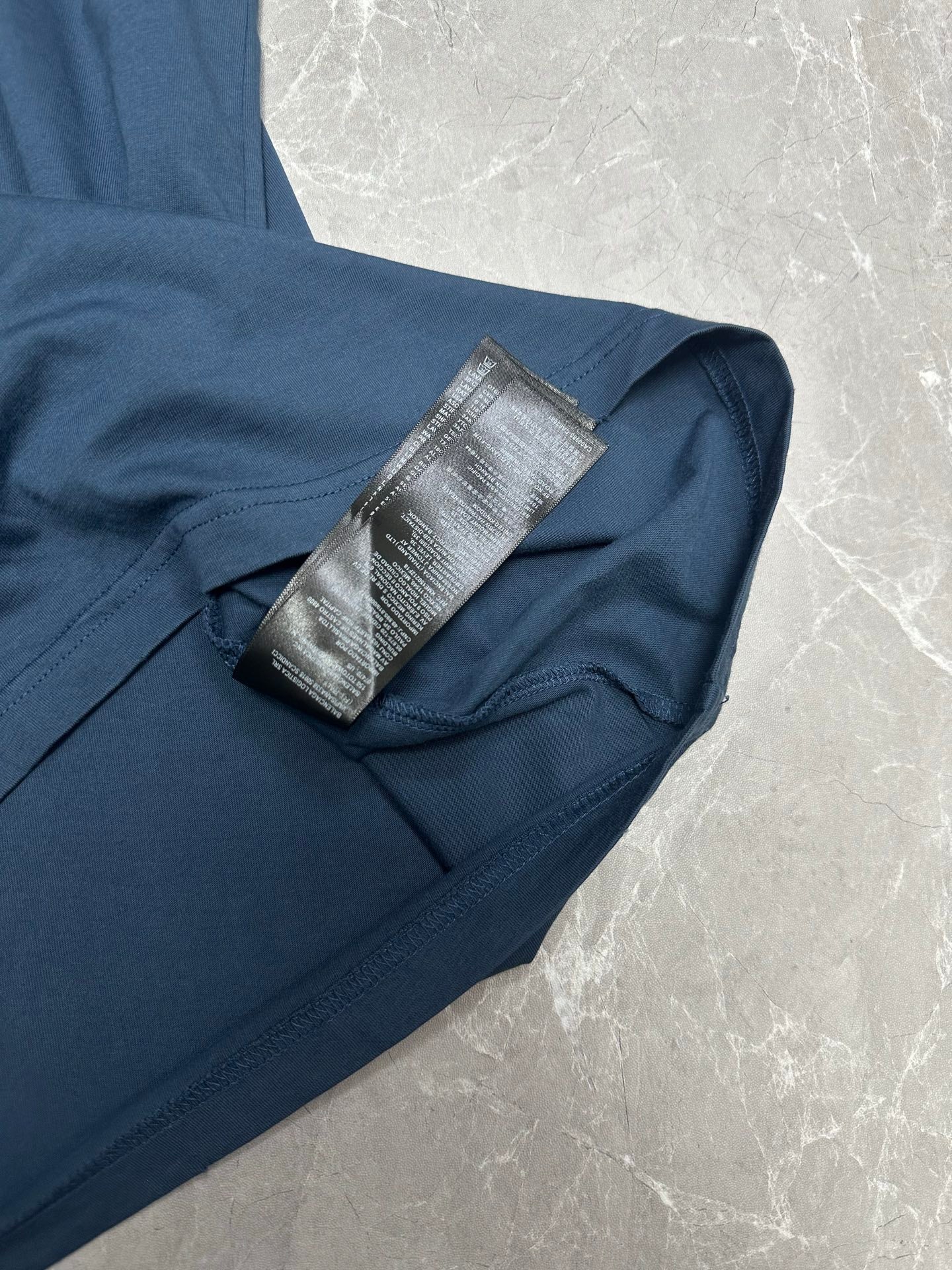 Balenciaga short-sleeve T-shirt close-up of inner neck label and seams